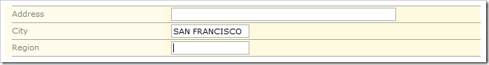 Upon exiting the City field, the JavaScript business rule converts the field value to uppercase.